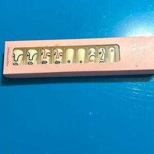 TIP Beauty Press On. Long white with face design. Glue INCLUDED.